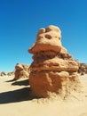 Hoodoo rock formation with dramatic shadows in Goblin Valley