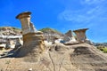 Hoodoo landscape under blue skies, Drumheller, Canada Royalty Free Stock Photo