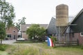 Hoogmade,The Netherlands,07-12-2022.Farmers protest.Upside down Dutch flag next to a farm