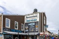 The Hook Fish and Chips restaurant with people walking and retails stores along the pier at Fisherman\'s Wharf on Pier 39