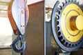 The hook of an industrial crane and a disc for sorting