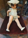 Hook Norton Brewery and Museum - Vintage doll on a chair.