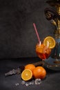 Hookah shisha, glass of cocktail, oranges and ice on dark gray background with copy space. Cocktail Aperol spritz. Hookah bar Royalty Free Stock Photo