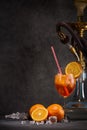 Hookah shisha, glass of cocktail, oranges and ice on dark gray background with copy space. Cocktail Aperol spritz. Hookah bar Royalty Free Stock Photo