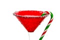 candy cane on red martini glass