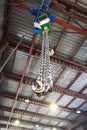 Hooks of weigher bridge crane in warehouse Royalty Free Stock Photo