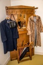 Hoorn, Netherlands, March 2022. Old-fashioned wardrobe and coat rack in a Dutch house.