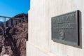 Hoover Dam memorial plaque in honor of President Herbert Hoover. Mike O Callaghan Pat Tillman Memorial Bridge. - Boulder City,