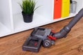 Hoovering a parquet Royalty Free Stock Photo