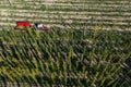 Hop harvest or hop picking with tractor aerial view.