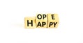 Hope and happy symbol. Concept words Hope and Happy on wooden cubes. Beautiful white table white background. Business hope and Royalty Free Stock Photo