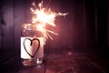 Hope for love, still life with heart jar and burning sparkler Royalty Free Stock Photo