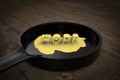 Hope in the shape of butter melts in the pan demonstrating lost hope concept. 3D illustration.