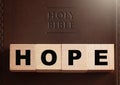 Hope Spelled in Blocks on a Leather Holy Bible Royalty Free Stock Photo