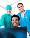 Hopeful male doctors looking at X-Ray Royalty Free Stock Photo