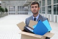 Hopeless businessman getting fired isolated Royalty Free Stock Photo