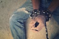 Hopeless man hands tied together with rope Royalty Free Stock Photo