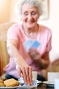 Hoping for a good card. seniors playing cards in their retirement home. Royalty Free Stock Photo