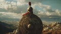 A hoplite holds his shield high displaying the emblem of his citystate as a sign of loyalty and bravery