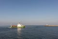 Hopper Dredger Vessel working near port gates Royalty Free Stock Photo