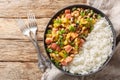 Hoppin John or Carolina peas and rice, is a black-eyed peas and rice with vegetables dish closeup on the plate. Horizontal top Royalty Free Stock Photo