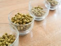 Hops pellets in glass cup for brewing beer - Beer ingredient