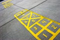 Hopscotch board at schoolyard Royalty Free Stock Photo