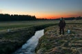 Hora Svateho Sebestiana, Czech republic - April 27, 2020: author of this photo stand near Cerna creek between czech and german