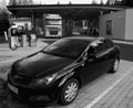 Hora Svateho Sebestiana, Czech republic - April 28, 2020: black car Opel Astra stand on filling station at spring evening