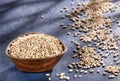 Hordeum vulgare - Dried pearl barley in a wooden bowl Royalty Free Stock Photo