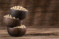 Hordeum vulgare - Pearl barley in three wooden bowls Royalty Free Stock Photo