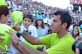 Horia Tecau ATP Tennis player signs balls