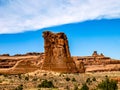 The horizon filled with giant red rocks standing on folded rocks, Arches National Park, UT, USA Royalty Free Stock Photo