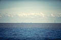 Horizon with houses on the Gulf of Finland, blue sea and sky