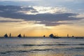 Horizon with Sailing and catamaran silhouette over the sea at sunset Royalty Free Stock Photo