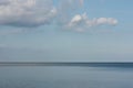 Horizon separating water surface and clouds sky Royalty Free Stock Photo