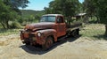 Sunny summer image of a vintage red orange pickup truck on a farm Royalty Free Stock Photo