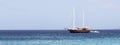 Horizontal banner or header with luxury sailing ship moored in turquoise water sea of wild Sardinia Island - Retro sailing yacht -