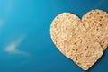 Passover, traditional Jewish food, Jewish matzo cake in the shape of a heart, place for text