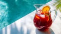 Horizontal banner with with a pitcher of Spanish sangria on the side of the pool, summer hotel vacation Royalty Free Stock Photo