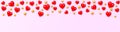 Horizontal banner with realistic red hearts and gold beads isolated on a rose background. Happy Valentine`s Day panorama Royalty Free Stock Photo