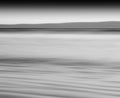 Horizontal black and white ocean milk motion blur abstraction ba