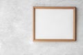 A3, A4 horizontal blank picture frame mockup template for photographs hanging white gray concrete wall background