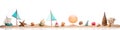 Horizontal border of various beach items, accessories and toys scattered on a white background. Summer vacation concept
