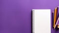 Horizontal purple background back to school concept pencils white notebook copy space, top view flat lay, teacher\'s day Royalty Free Stock Photo