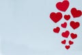 Horizontal card Valentine`s Day. Red hearts on a gray-blue background Royalty Free Stock Photo