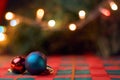 Horizontal Christmas background with Christmas balls on table wi