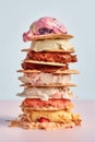 Horizontal close-up of a stack of several types of ice cream. Royalty Free Stock Photo