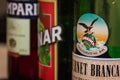 View of Fernet Branca, Cynar and Campari apperitive bottles in a row