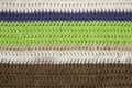 horizontal colored crochet lines pattern, beige, blue, green and brown colors